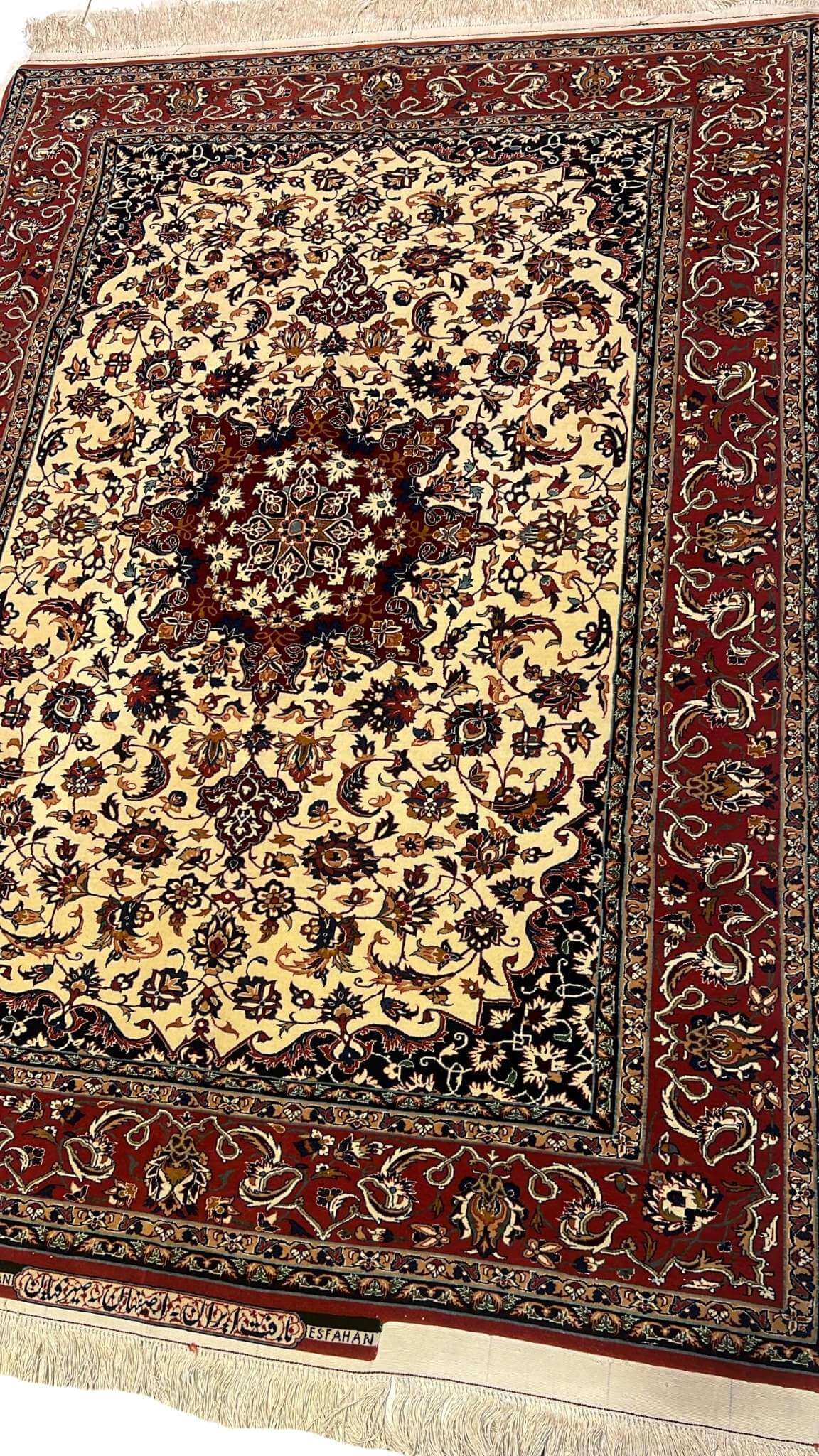 "Luxury Isfahan Seirafian floral rug with intricate medallion design, made from wool and silk, featuring traditional Persian craftsmanship."